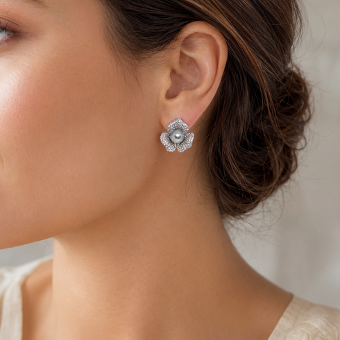 Flower Akoya pearl stud earrings with pavé silver petals and blue-gray center pearl