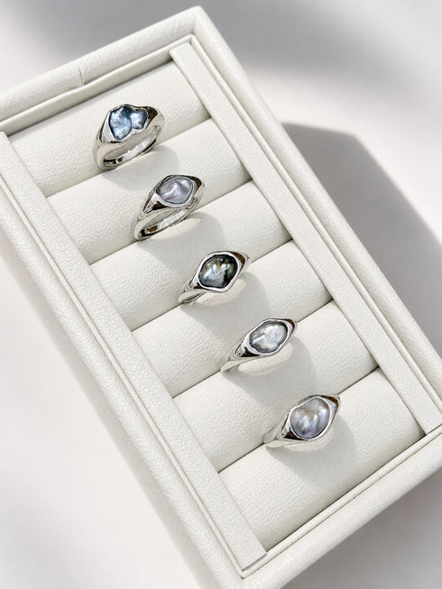 Rings: Tahitian Keshi Pearl Sculptural Open Ring — five silver-toned bands with blue-grey keshi pearls on a white display.