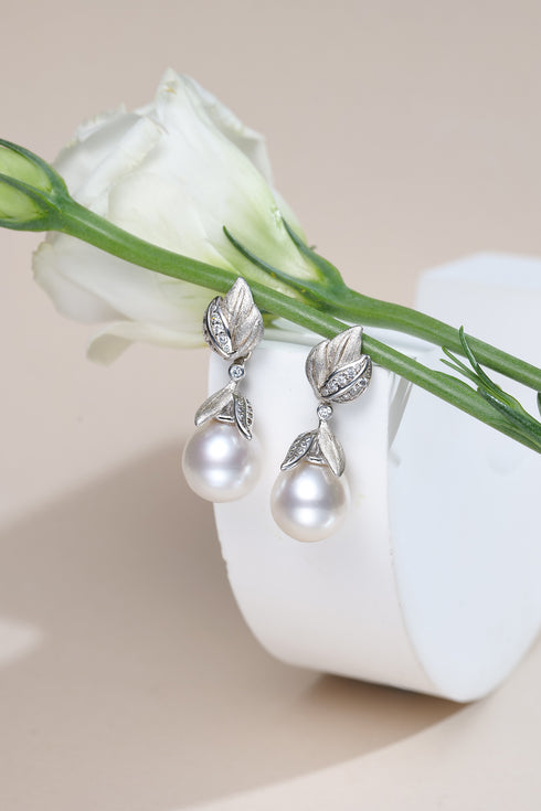 Pair of House Of Pearls earrings: 8–9mm freshwater pearl CZ drop with silver leaf accents