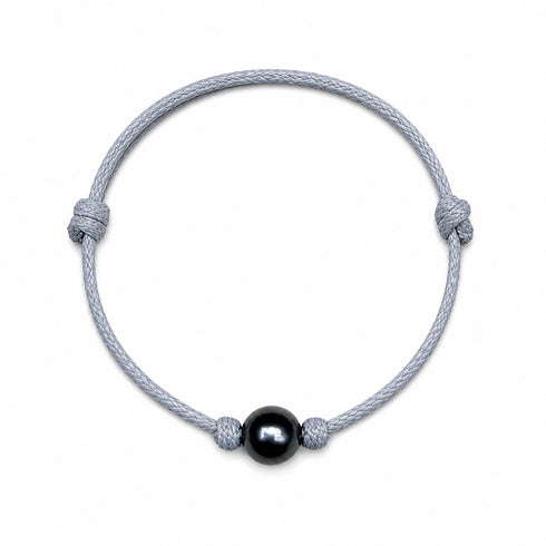Bracelet: Tahitian Baroque Pearl Knotted Leather, light gray braided cord with a central black pearl.