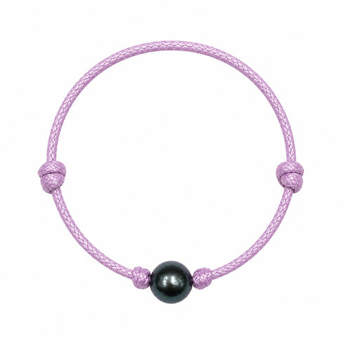 Bracelet Tahitian Baroque Pearl on a purple knotted leather cord with bead accents.