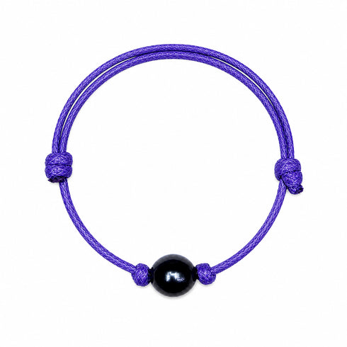 Tahitian Baroque Pearl Knotted Leather Bracelet on purple cord with a central black pearl bead