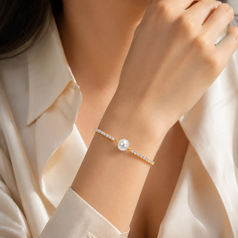 Aurora White Freshwater Pearl Tennis Bracelet by House Of Pearls, gold-tone band with pave diamonds and a central pearl
