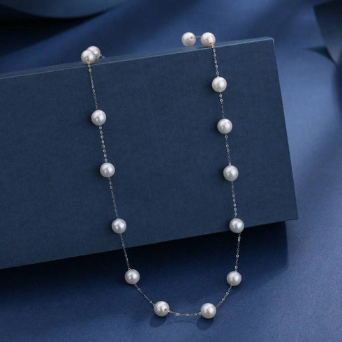 Pearl tincup necklace with 7-8mm white freshwater pearls on a silver chain