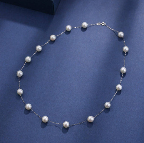 Pearl tincup necklace with 7–8mm white freshwater pearls on a silver chain