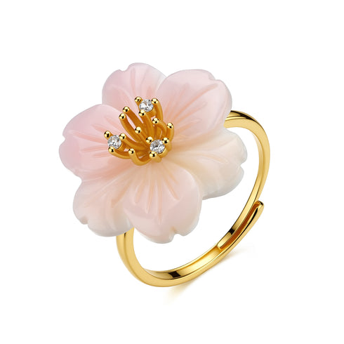 Princess Pink Queen Conch Shell Earrings featuring pink flower with gold-tone stamen and crystal accents