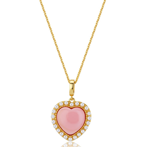 Gold vermeil necklace featuring a pink heart conch shell pendant surrounded by a pearl halo