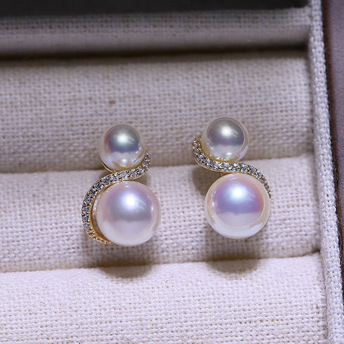 S Shape Double Pearl Earrings with white pearls and a gold-tone, diamond-studded curved motif