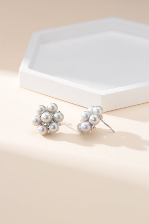 Pair of silver multi-pearl stud earrings with a freshwater pearl cluster design