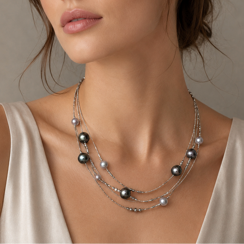 Triple-layer Tahitian Baroque Pearl Necklace by House Of Pearls TA, 6–10mm dark pearls on silver-tone chains.