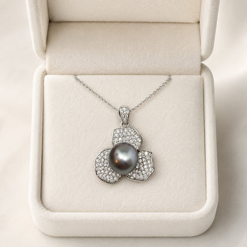 Necklace: Tahitian Pearl Flower pendant with diamond pavé petals on a silver chain, House of Pearls