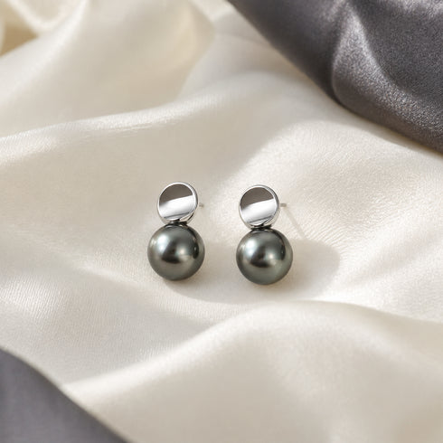 Pair of Tahitian Pearl Eclipse stud earrings by House Of Pearls, dark gray pearls with silver-tone tops