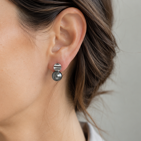 Earrings: House Of Pearls 10–11mm Tahitian Pearl Eclipse Studs with silver-toned disc tops and dark pearls.