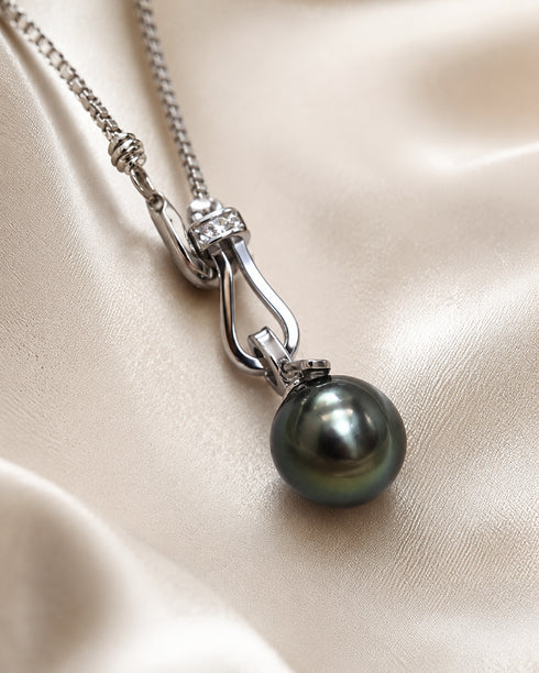 Necklace featuring an 11–12mm Tahitian pearl pendant on a sterling silver lucky chain, diamond-accent bail.