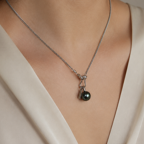 Necklace: 11–12mm Tahitian pearl pendant on a sterling silver lucky chain by House of Pearls