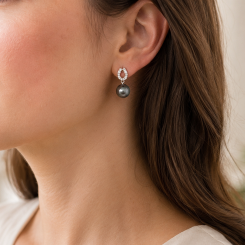 Earrings Tahitian South Sea Pearl Lunar Arch with a diamond-studded silver arch and dark pearl drop