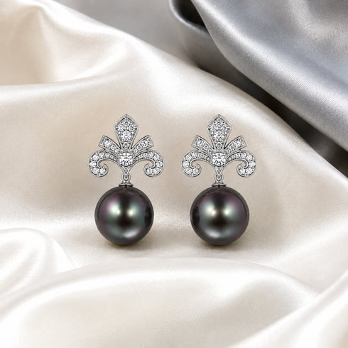 Earrings: Tahitian Noir Iris Crown Drop pair with crystal-embellished silver crowns and dark pearls.