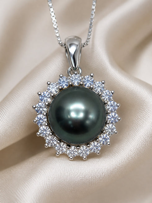 Sunflower pendant necklace in sterling silver featuring an 11-12mm Tahitian pearl surrounded by a halo of CZ stones