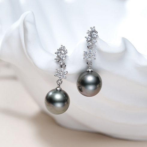 Earrings: House Of Pearls Tahitian Stellar Night Drop, pair of 10–11mm dark pearl drops with diamond-accent toppers