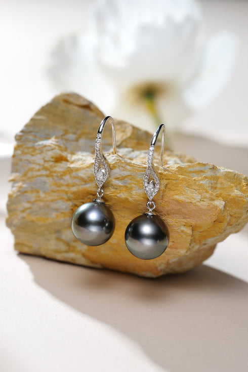 Earrings: 9–10mm Tahitian pearl drop earrings with diamond-accented halo on silver hooks (pair)