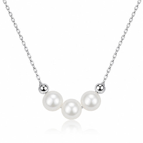 6-7mm Drops Smile freshwater pearl necklace with three white pearls and silver accents on a silver chain