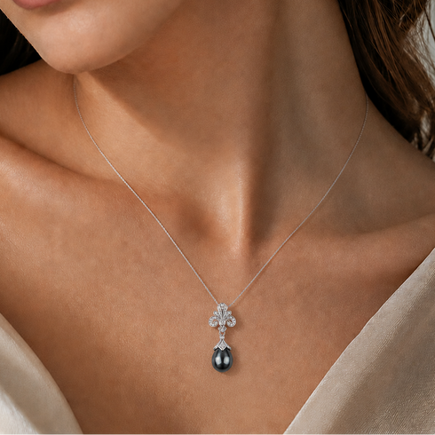 Waterdrop Tahitian Pearl Vintage Pendant necklace with a silver chain and a black Tahitian pearl.
