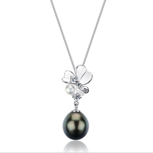 Tahitian Black Pearl Necklace with a silver flower pendant, crystal accents, and a dark pearl drop on a silver chain