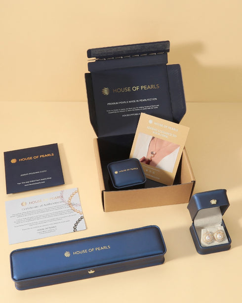 Pearl necklace by House of Pearls in blue gift box with white freshwater pearls and certificates