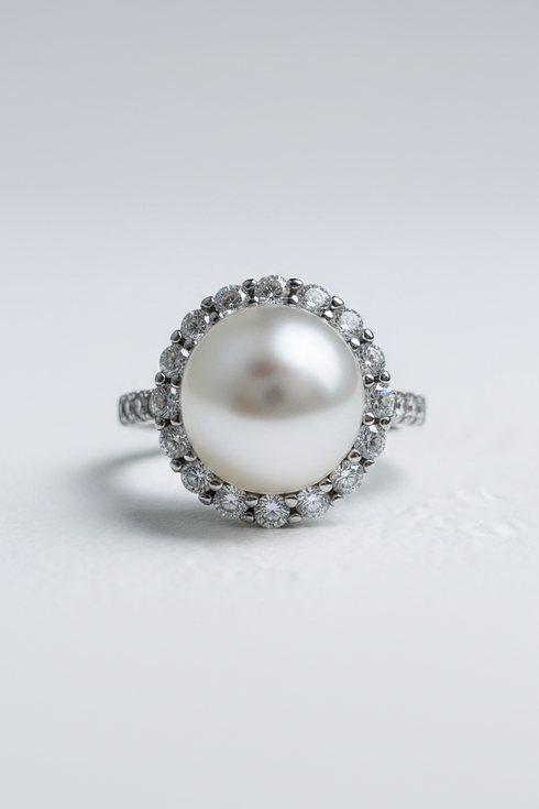Pendant with white South Sea pearl surrounded by a halo of cubic zirconia, House Of Pearls