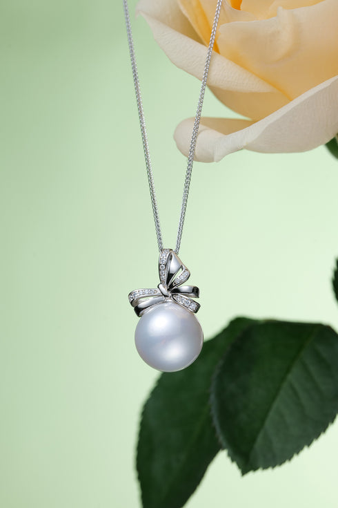 13-14mm Freshwater Ribbon Grace Pendant Necklace by House Of Pearls with a silver butterfly-accented pearl pendant
